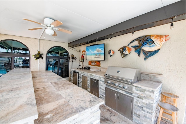 view of patio / terrace featuring an outdoor kitchen, a grill, and ceiling fan