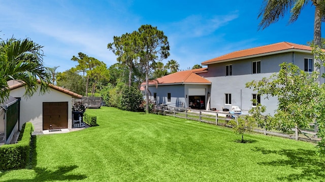 view of yard featuring an attached garage