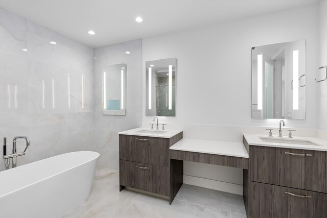 475 E Royal Palm Rd Unit 205, Boca Raton, FL 33432 - full bathroom with a freestanding bath, two vanities, recessed lighting, and marble finish flooring