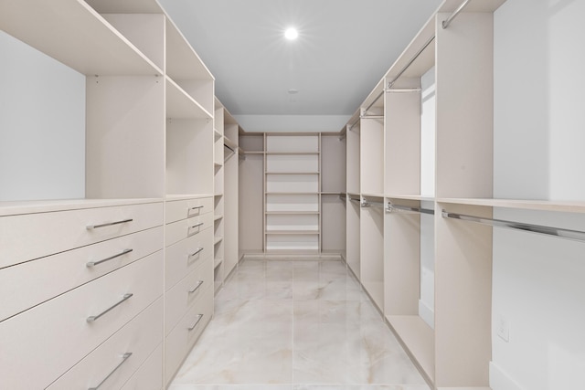 475 E Royal Palm Rd Unit 205, Boca Raton, FL 33432 - walk in closet with light marble finish flooring