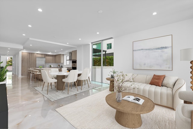 475 E Royal Palm Rd Unit 205, Boca Raton, FL 33432 - living room with recessed lighting, healthy amount of natural light, and light marble finish floors