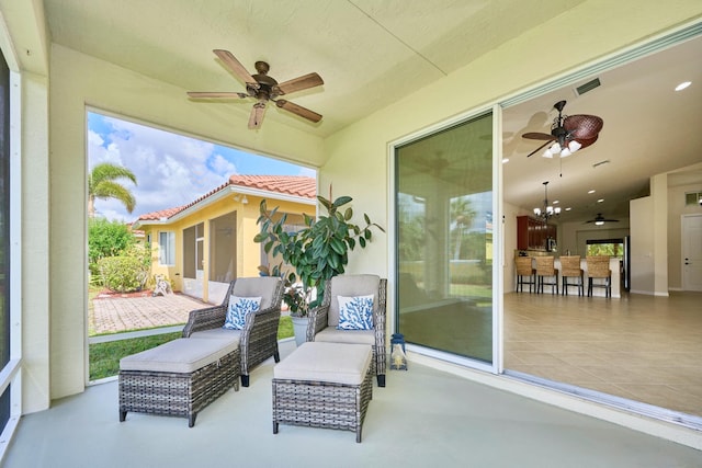 view of patio with ceiling fan