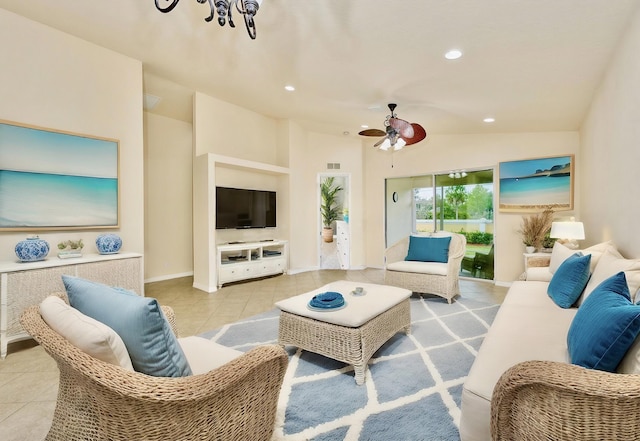 tiled living area with a ceiling fan, recessed lighting, and baseboards