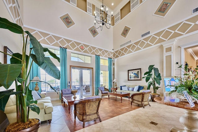 lobby featuring a high ceiling and ornamental molding