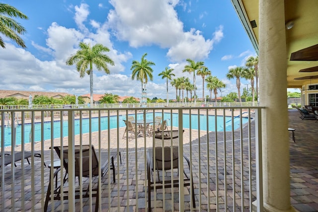 community pool featuring fence