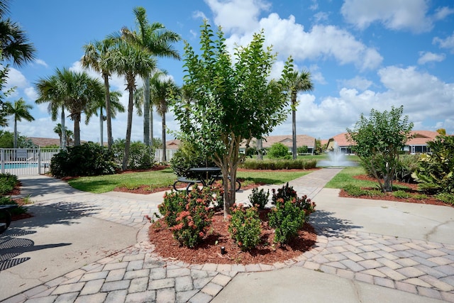 surrounding community featuring fence