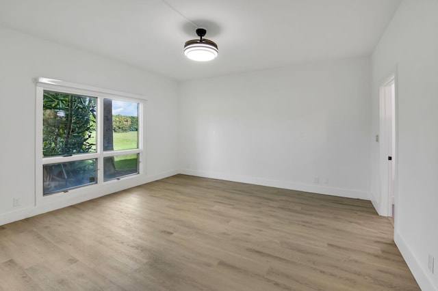 7884 Seville Pl Unit 1301, Boca Raton, FL 33433 - empty room featuring light wood-style floors and baseboards