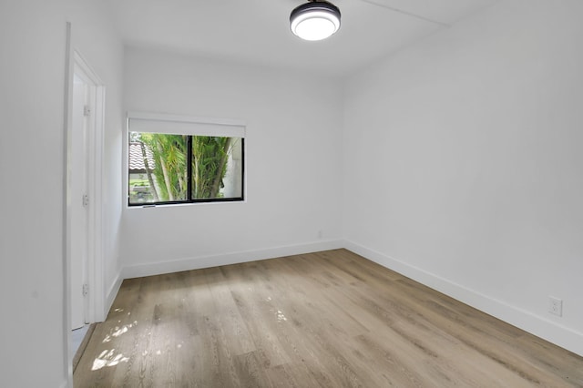 7884 Seville Pl Unit 1301, Boca Raton, FL 33433 - unfurnished room featuring wood finished floors and baseboards