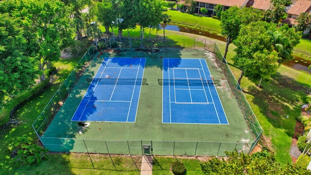 7884 Seville Pl Unit 1301, Boca Raton, FL 33433 - view of tennis court with fence and a water view