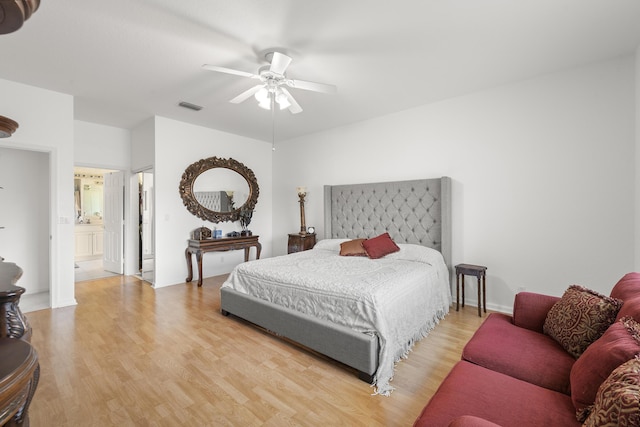 bedroom featuring wood finished floors and a ceiling fan