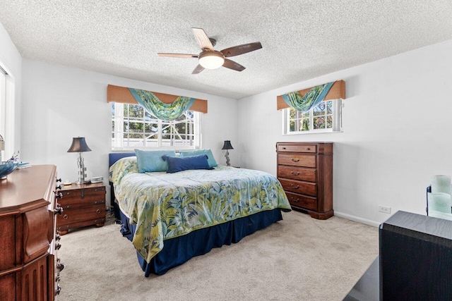 639 Mallard Dr, Delray Beach, FL 33444 - bedroom featuring carpet, a textured ceiling, and a ceiling fan