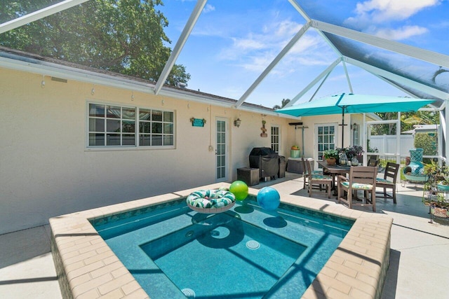 639 Mallard Dr, Delray Beach, FL 33444 - view of swimming pool with a patio area, grilling area, a lanai, and outdoor dining space