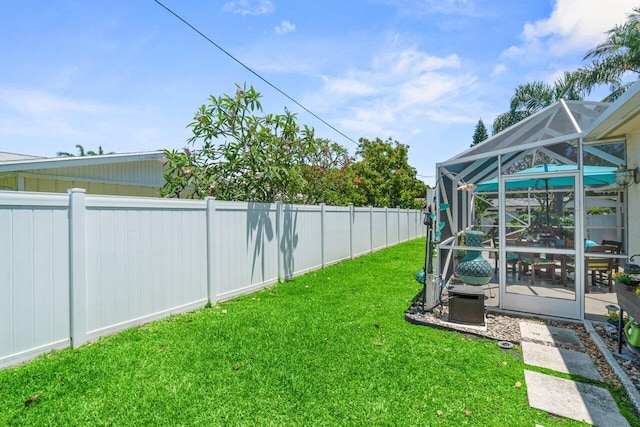 639 Mallard Dr, Delray Beach, FL 33444 - view of yard featuring a patio area and a lanai