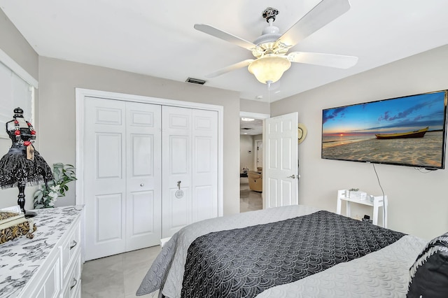 bedroom featuring a closet and ceiling fan