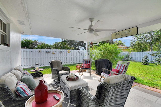 view of patio featuring an outdoor living space, ceiling fan, and area for grilling