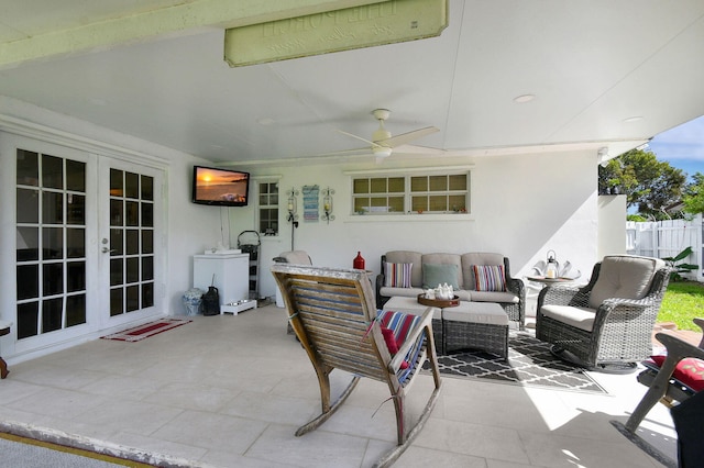 view of patio featuring french doors, an outdoor living space, a ceiling fan, and fence
