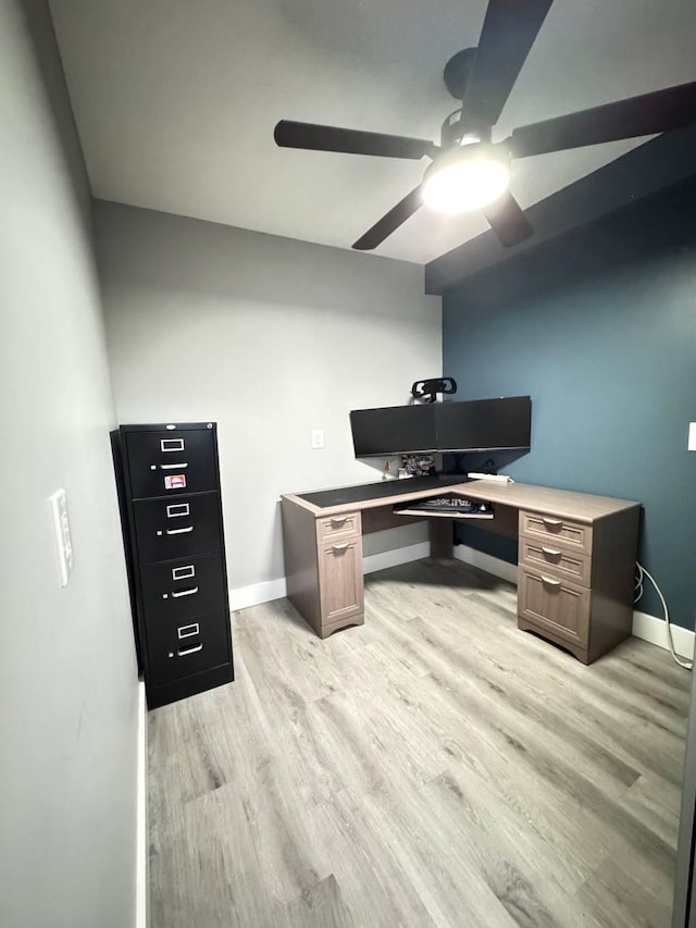 office with ceiling fan, baseboards, and light wood finished floors