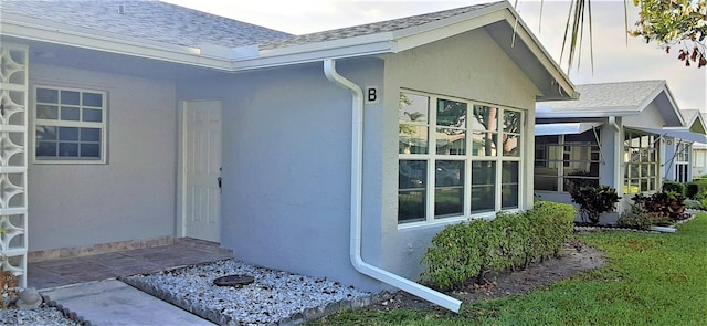 14516 Canalview Dr Unit B, Delray Beach, FL 33484 - entrance to property featuring a shingled roof and stucco siding
