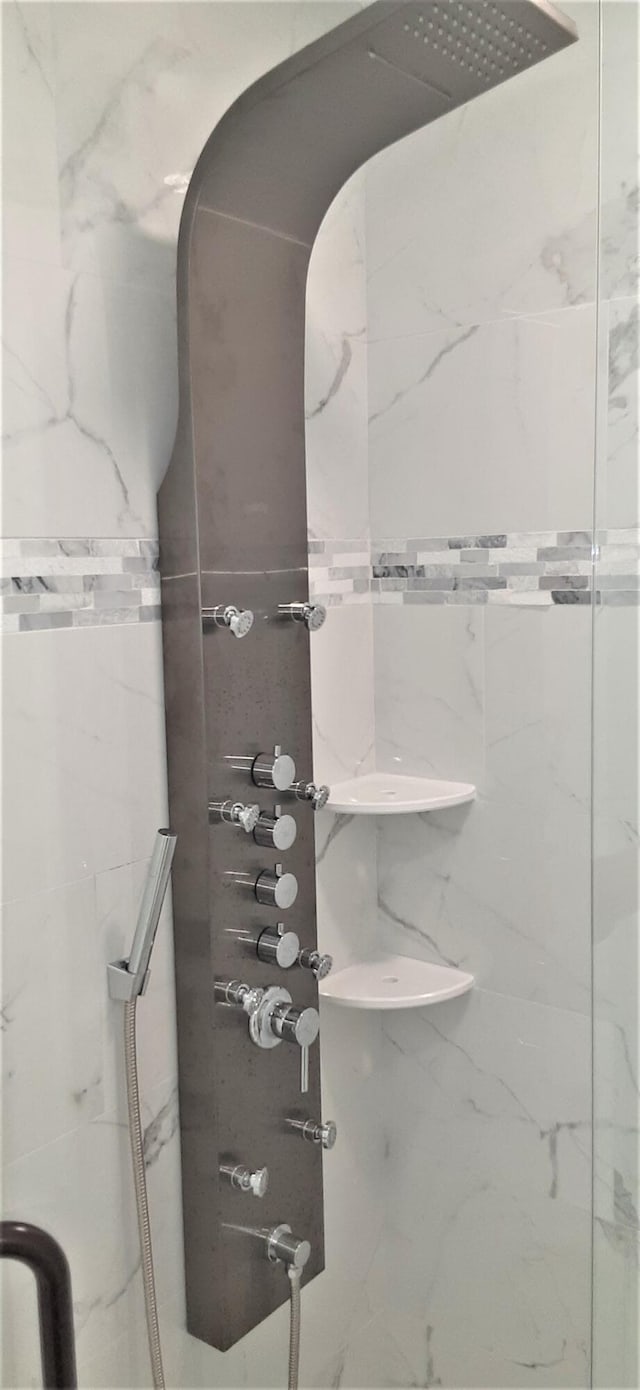 14516 Canalview Dr Unit B, Delray Beach, FL 33484 - full bathroom with a marble finish shower