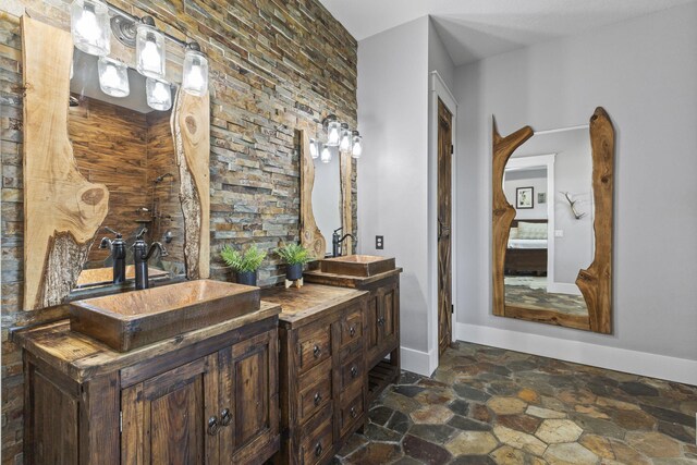 1545 Pulitzer Rd, Fort Pierce, FL 34945 - full bath with stone finish flooring and double vanity