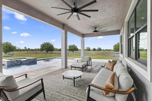 1545 Pulitzer Rd, Fort Pierce, FL 34945 - view of patio / terrace with ceiling fan, outdoor lounge area, a pool with connected hot tub, and a view of countryside