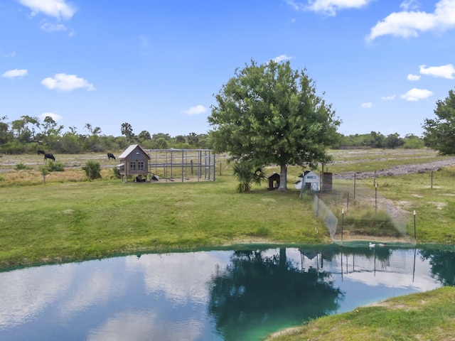 1545 Pulitzer Rd, Fort Pierce, FL 34945 - view of grassy yard featuring a view of countryside, an outdoor structure, and exterior structure