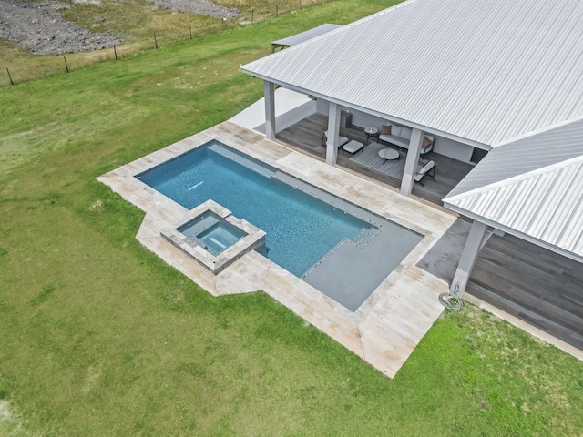 1545 Pulitzer Rd, Fort Pierce, FL 34945 - view of swimming pool with a pool with connected hot tub, an outdoor hangout area, and a patio