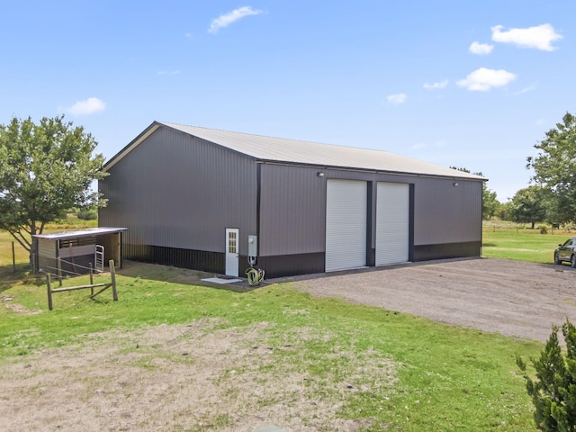 1545 Pulitzer Rd, Fort Pierce, FL 34945 - view of outbuilding featuring an outdoor structure and driveway