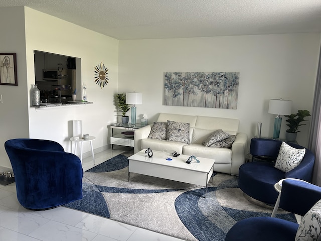 99 Easthampton E, West Palm Beach, FL 33417 - living room with marble finish floors and a textured ceiling