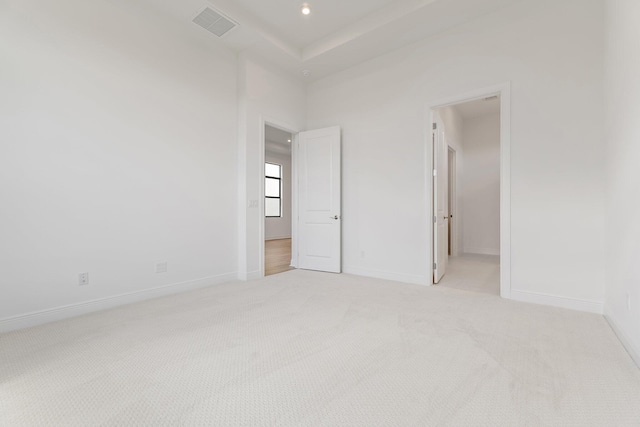 308 SE Via Sangro, Port Saint Lucie, FL 34987 - unfurnished bedroom featuring light carpet, baseboards, and recessed lighting