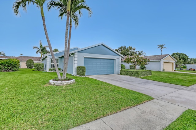 1265 Pine Sage Cir, West Palm Beach, FL 33409 - ranch-style home with a front yard, an attached garage, driveway, and stucco siding