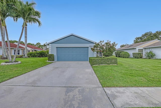 1265 Pine Sage Cir, West Palm Beach, FL 33409 - ranch-style house with a front lawn, concrete driveway, an attached garage, and stucco siding