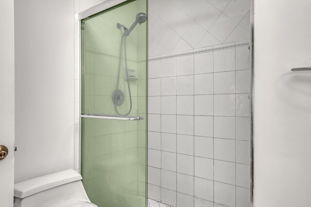 1265 Pine Sage Cir, West Palm Beach, FL 33409 - full bathroom with toilet and tiled shower