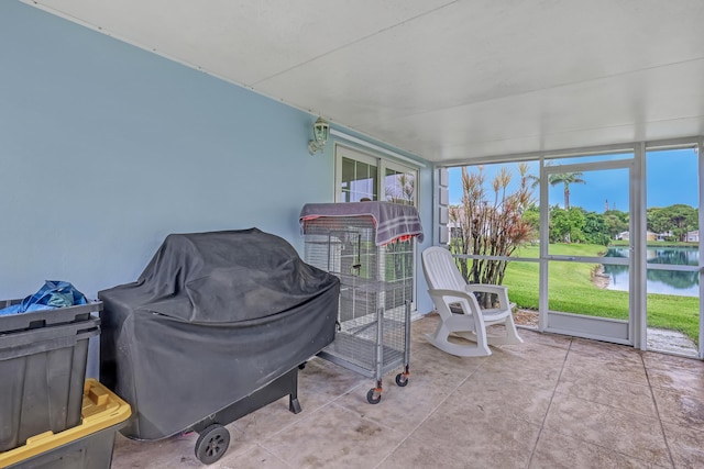 1265 Pine Sage Cir, West Palm Beach, FL 33409 - sunroom featuring a water view