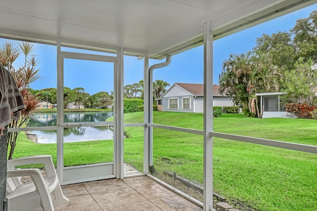 1265 Pine Sage Cir, West Palm Beach, FL 33409 - unfurnished sunroom with a water view