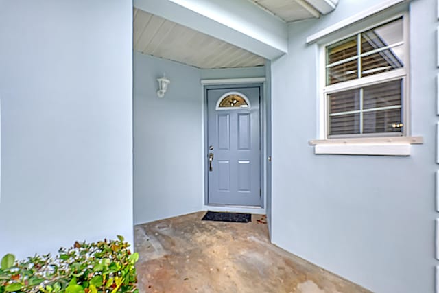 1265 Pine Sage Cir, West Palm Beach, FL 33409 - property entrance with stucco siding