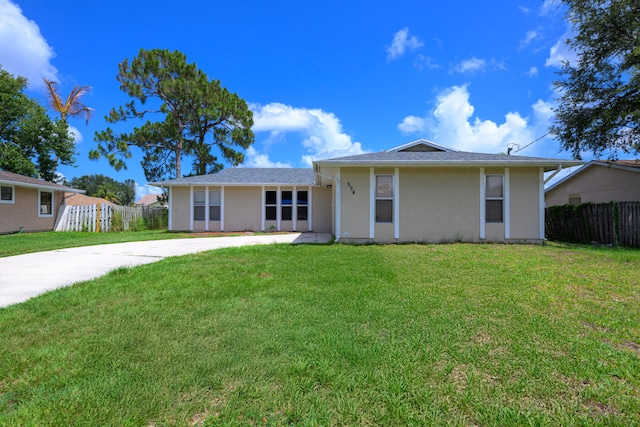 554 NW Twylite Ter, Port Saint Lucie, FL 34953 - view of front of property featuring concrete driveway and stucco siding