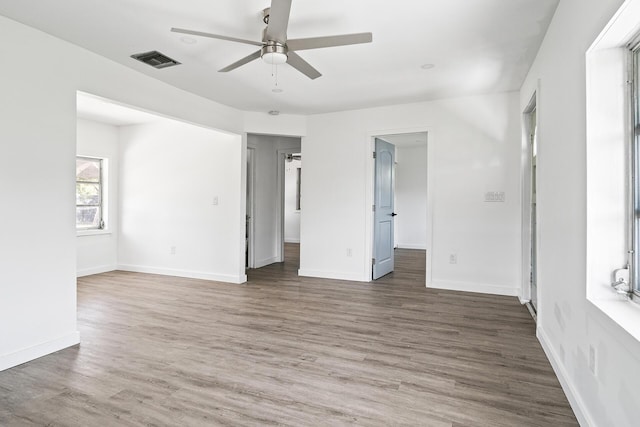 604 W Ocean Ave, Lantana, FL 33462 - empty room featuring ceiling fan, wood finished floors, and baseboards