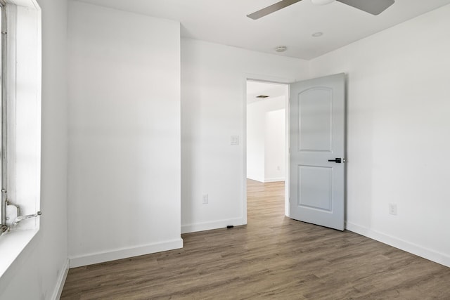 604 W Ocean Ave, Lantana, FL 33462 - unfurnished room featuring ceiling fan, wood finished floors, baseboards, and a smoke detector