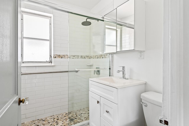 604 W Ocean Ave, Lantana, FL 33462 - bathroom with a stall shower, toilet, and vanity