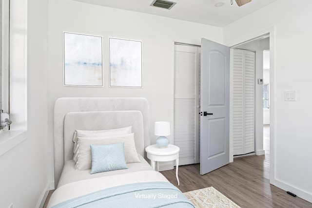 604 W Ocean Ave, Lantana, FL 33462 - bedroom featuring wood finished floors and baseboards