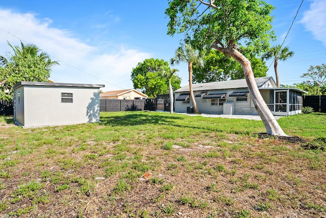 604 W Ocean Ave, Lantana, FL 33462 - view of yard featuring a sunroom