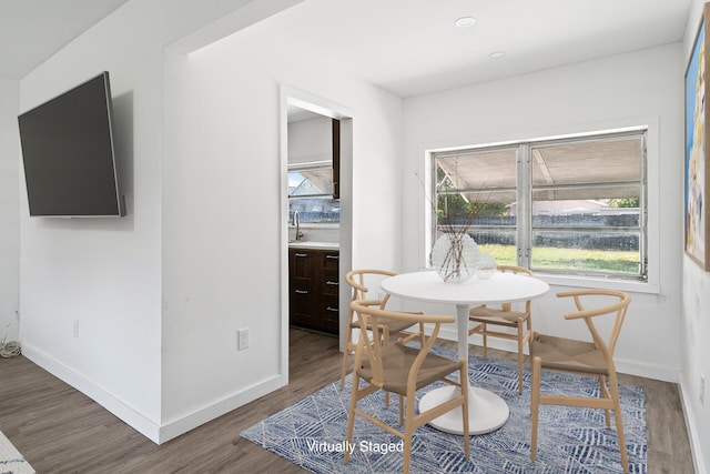 604 W Ocean Ave, Lantana, FL 33462 - dining area featuring wood finished floors and baseboards