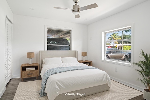 604 W Ocean Ave, Lantana, FL 33462 - bedroom featuring baseboards, wood finished floors, and a ceiling fan