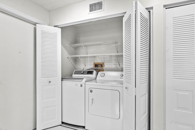 10535 Ladypalm Ln Unit B, Boca Raton, FL 33498 - clothes washing area with washing machine and clothes dryer