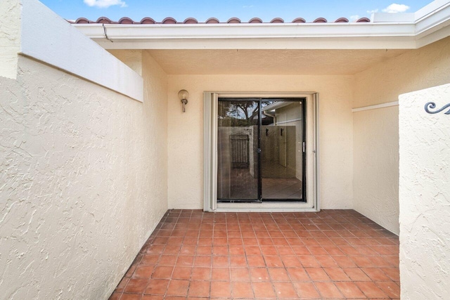 10535 Ladypalm Ln Unit B, Boca Raton, FL 33498 - view of exterior entry with stucco siding