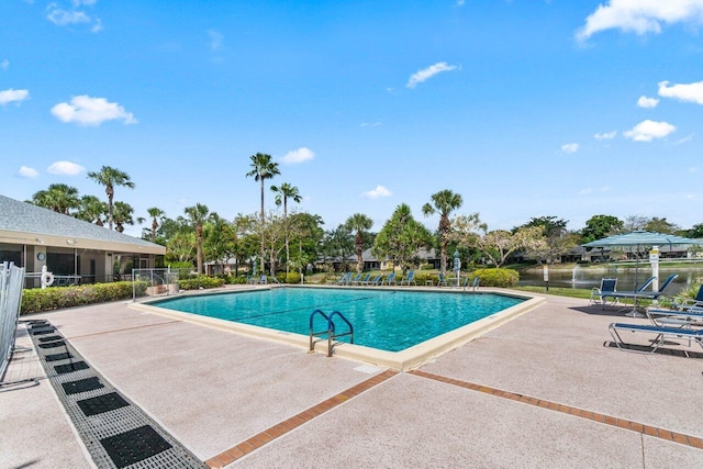 10535 Ladypalm Ln Unit B, Boca Raton, FL 33498 - community pool with a patio and fence