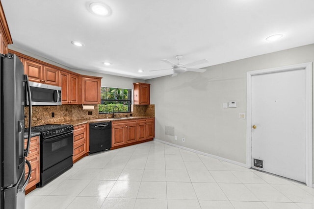 10535 Ladypalm Ln Unit B, Boca Raton, FL 33498 - kitchen featuring black appliances, a sink, decorative backsplash, ceiling fan, and brown cabinetry