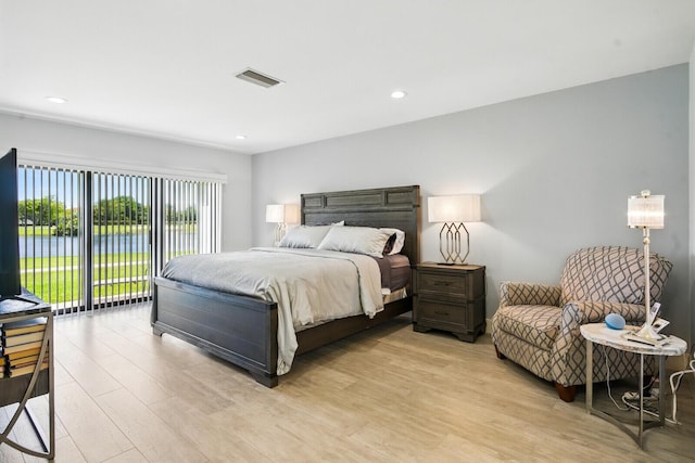 21188 Juego Cir Unit 17-A, Boca Raton, FL 33433 - bedroom featuring light wood-style floors, access to outside, and recessed lighting