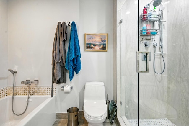 21188 Juego Cir Unit 17-A, Boca Raton, FL 33433 - bathroom with a stall shower, toilet, and a garden tub